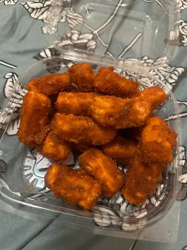 Paneer pakora fritters ready for takeout at Lovely Sweets Calgary